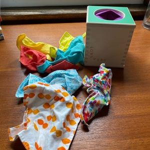 Lovevery magic tissue box with all of the tissues